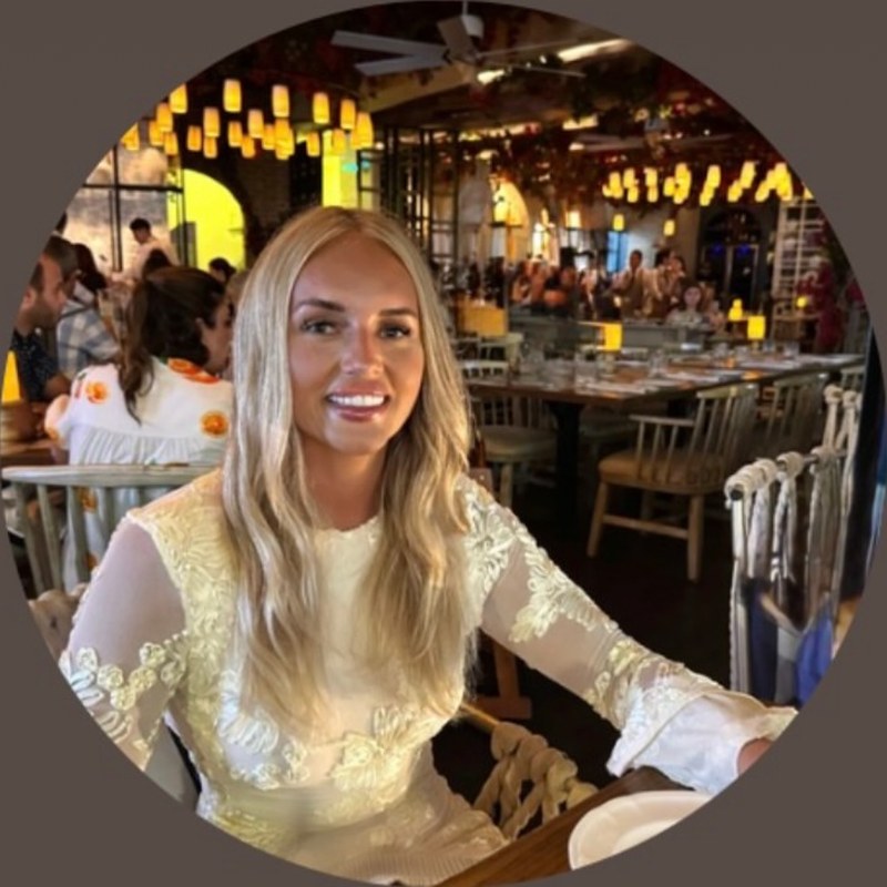 Georgia, founder of Skinlab & Beauty by G, smiling.